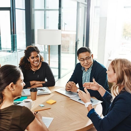 shot-of-a-group-of-businesspeople-having-a-meeting-in-an-office-800x800-1